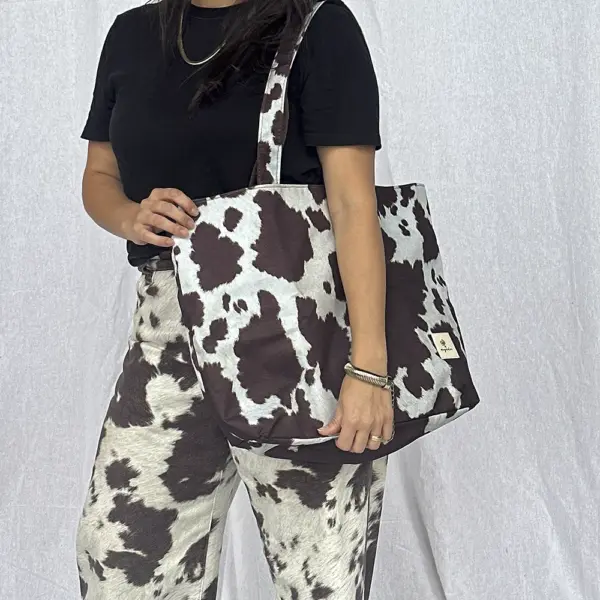 TOTE FLIP MAGNOLIA COW PRINT